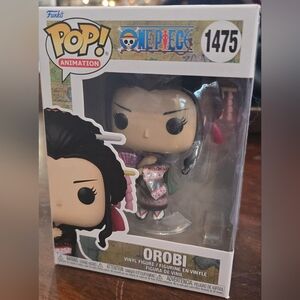 Funko Pop Orobi with Black Hair and Colorful Outfit